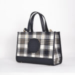 dempsey carryall with garden plaid print and coach patch