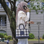 dempsey carryall with garden plaid print and coach patch