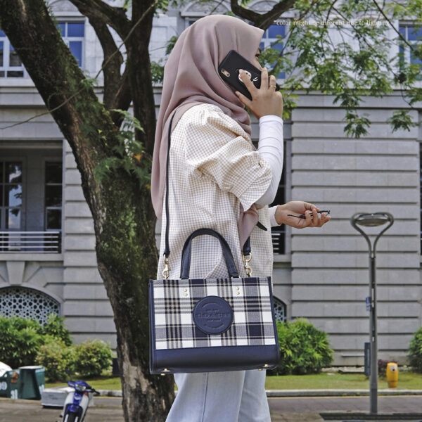 dempsey carryall with garden plaid print and coach patch