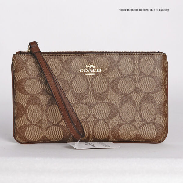 coach large wrislet in signature canvas
