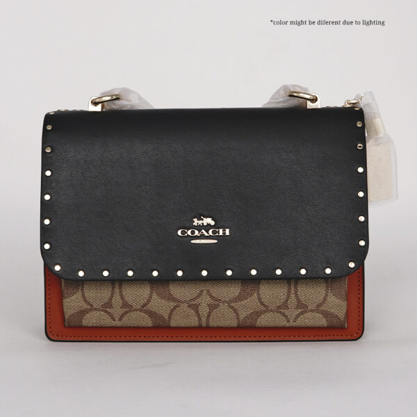 coach klare in signature canvas with rivets