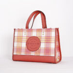 dempsey carryall with garden plaid print and coach patch