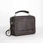 marc jacobs rubber logo print bag in brown
