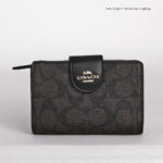 coach medium corner zip wallet in signature canvas