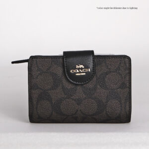 coach medium corner zip wallet in signature canvas