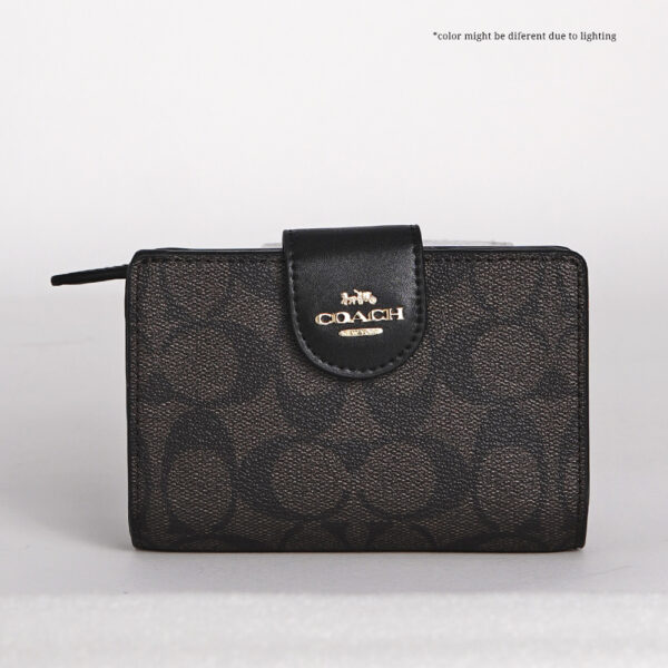 coach medium corner zip wallet in signature canvas