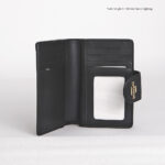 coach medium corner zip wallet in signature canvas