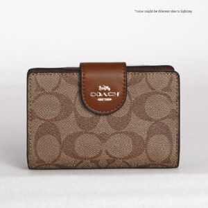 coach medium corner zip wallet in signature canvas