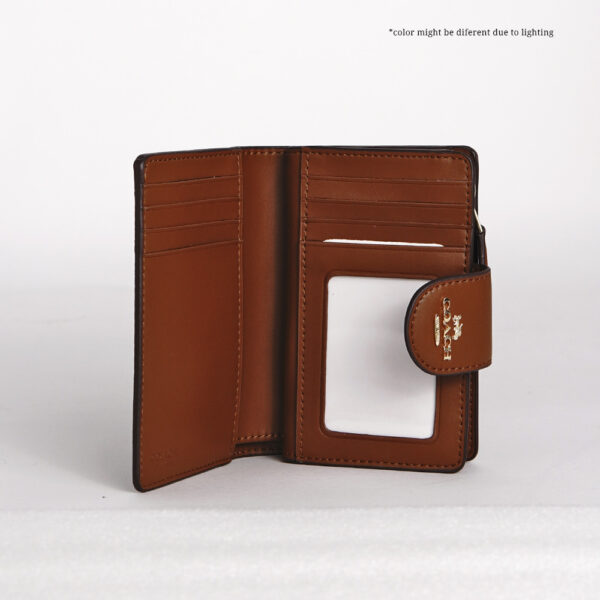 coach medium corner zip wallet in signature canvas