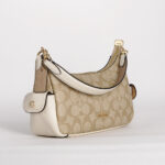 coach pennie shoulder bag 25 in signature canvas