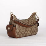 coach pennie shoulder bag 25 in signature canvas