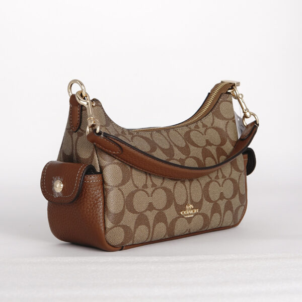 coach pennie shoulder bag 25 in signature canvas