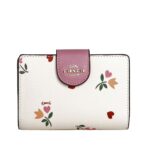 coach medium corner zip wallet in signature canvas with heart petal print