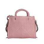 coach rogue 25 with quilting and rivets