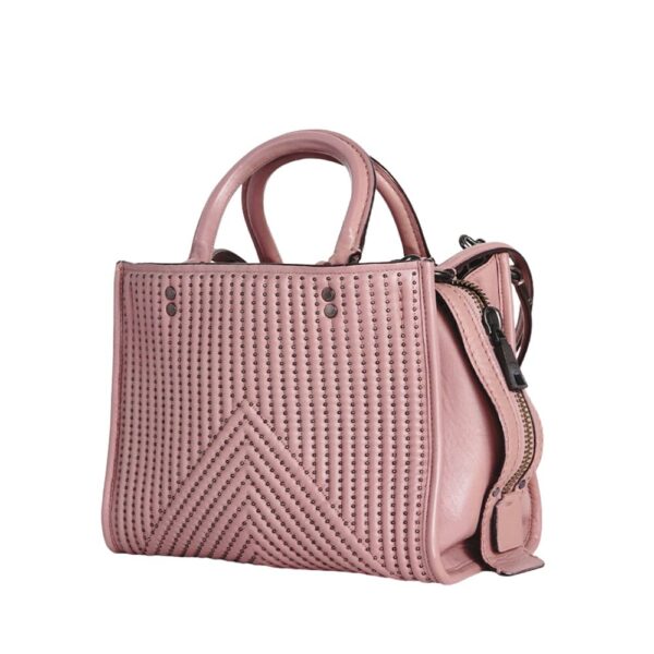coach rogue 25 with quilting and rivets