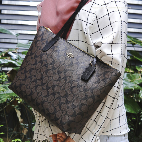 coach zip top tote in signature canvas