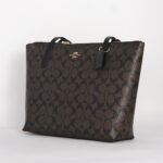 coach zip top tote in signature canvas