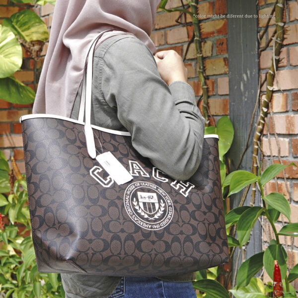 coach city tote in signature canvas with varsity motif