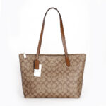coach zip top tote in signature canvas