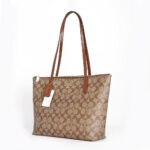 coach zip top tote in signature canvas