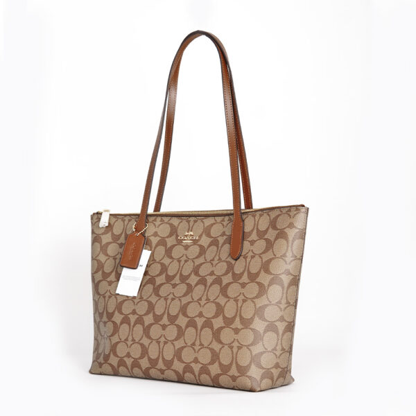 coach zip top tote in signature canvas