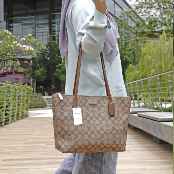 coach zip top tote in signature canvas