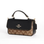 coach mini josie top handle crossbody in signature canvas