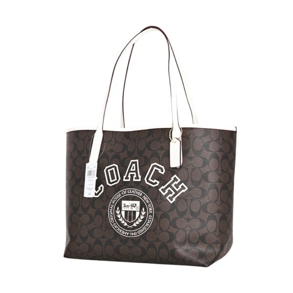 coach city tote in signature canvas with varsity motif