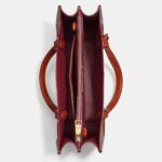 coach tyler carryall in signature canvas