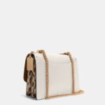 coach klare crossbody in signature canvas with rivets