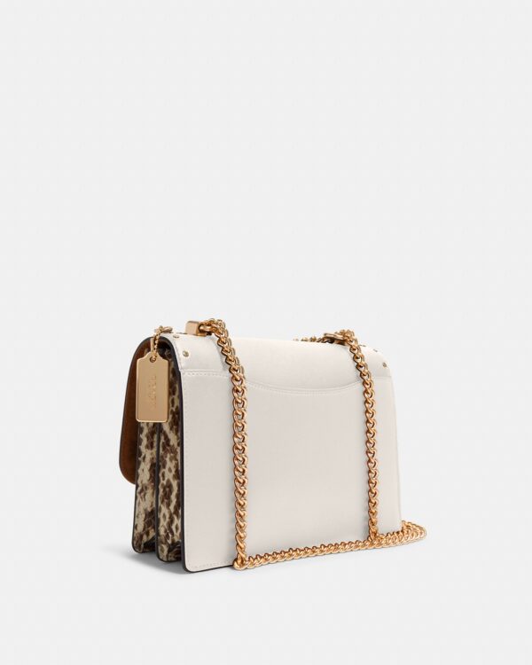 coach klare crossbody in signature canvas with rivets