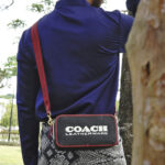 coach kia camera bag in colorblock