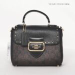 coach morgan top handle satchel in colorblock signature canvas with rivets