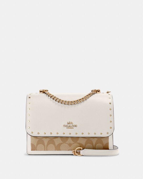 coach klare crossbody in signature canvas with rivets