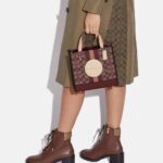 coach dempsey tote 22 in signature jacquard with stripe and coach patch