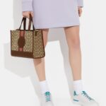 coach dempsey carryall in signature jacquard with stripe and coach patch