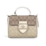 coach morgan top handle stachel in blocked signature canvas
