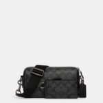 coach axel crossbody in signature canvas