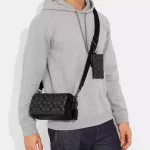 coach axel crossbody in signature canvas