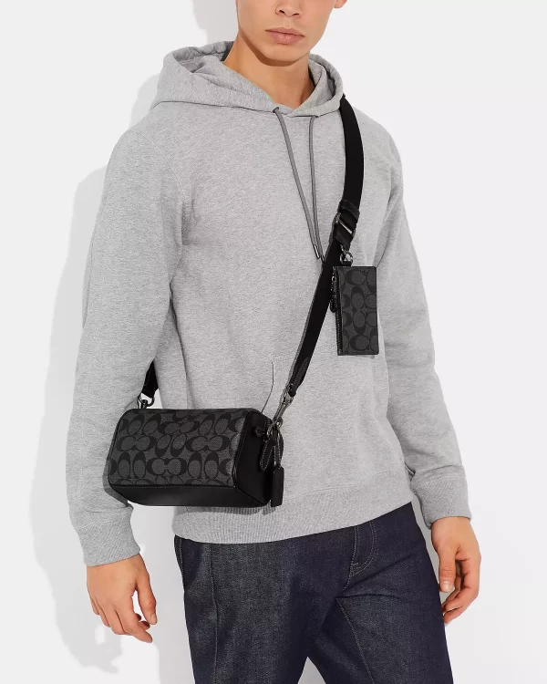 coach axel crossbody in signature canvas