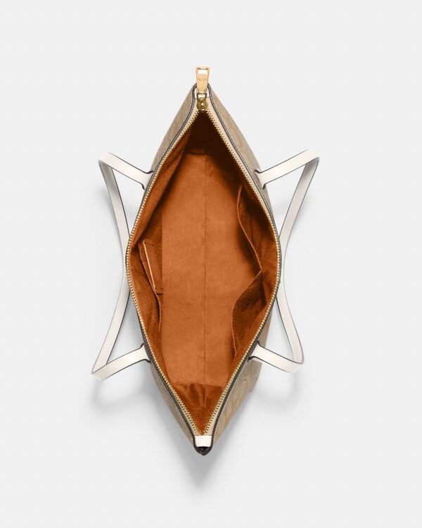 coach zip top tote in signature canvas