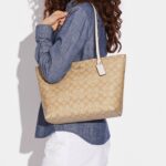 coach zip top tote in signature canvas