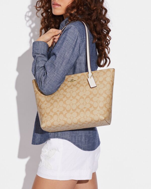 coach zip top tote in signature canvas