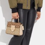 coach morgan top handle stachel in blocked signature canvas