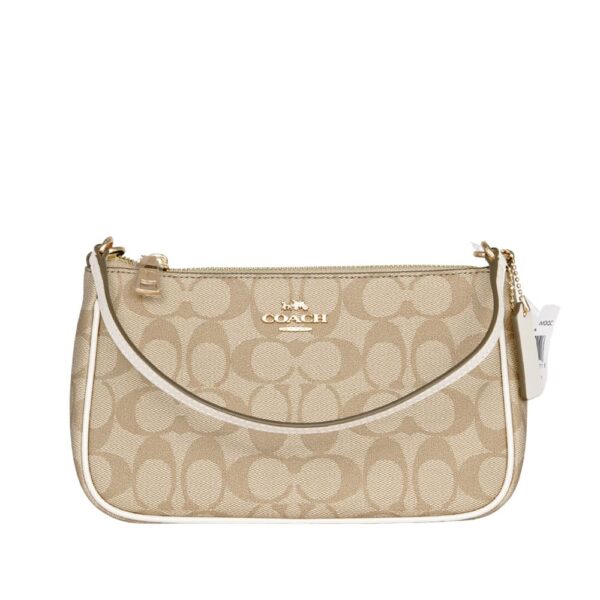 coach top handle pouch in signature canvas