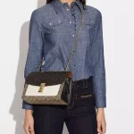 coach lane shoulder bag in blocked signature canvas