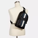 coach west pack in signature canvas with varsity stripe