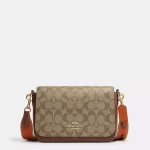 coach logan messenger in signature canvas