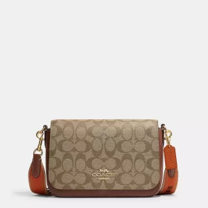 coach logan messenger in signature canvas