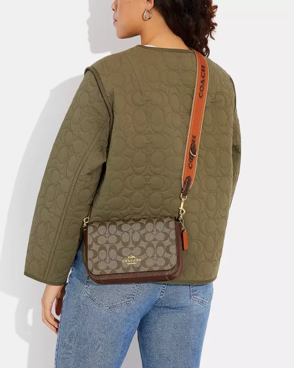 coach logan messenger in signature canvas